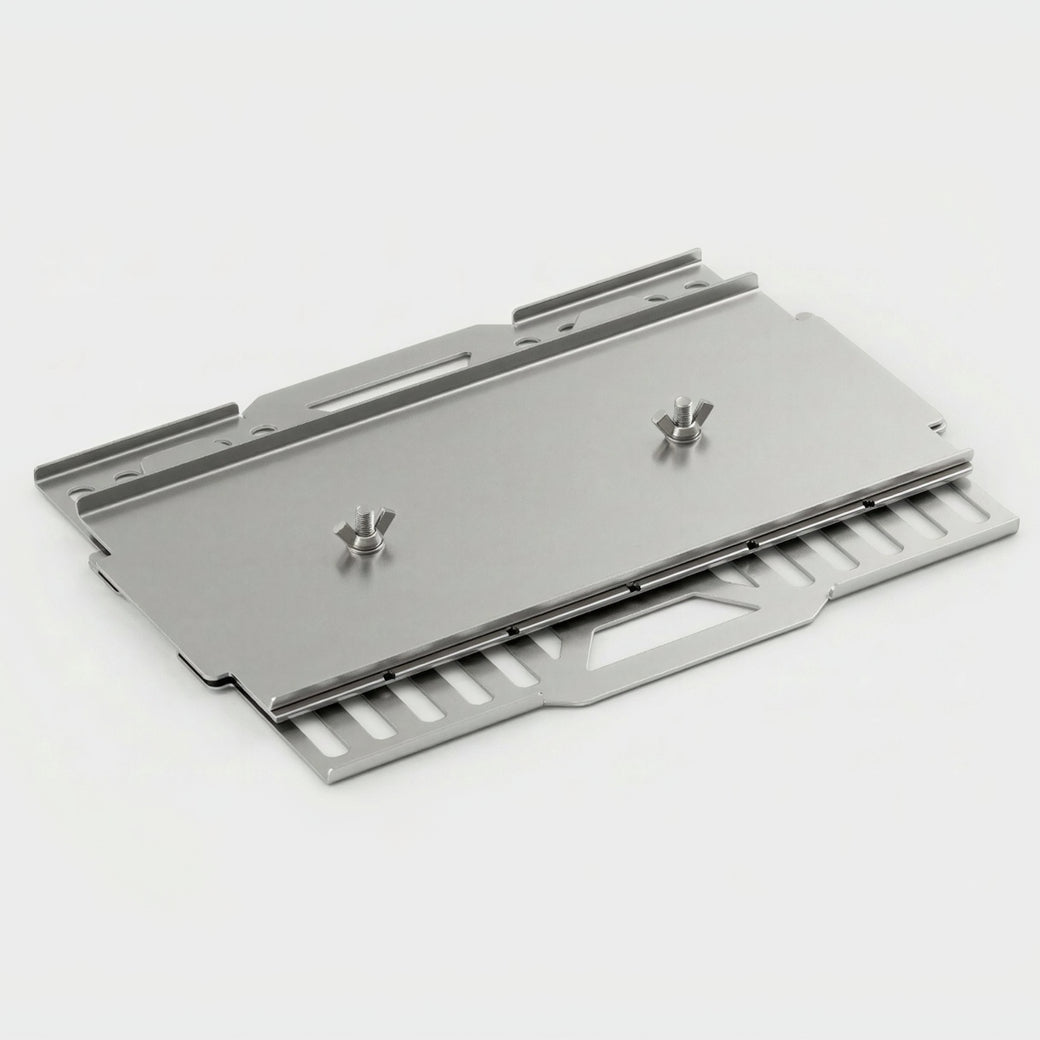 Stainless steel camping braai with modular flat-pack design and durable 3CR12 steel construction for outdoor grilling.